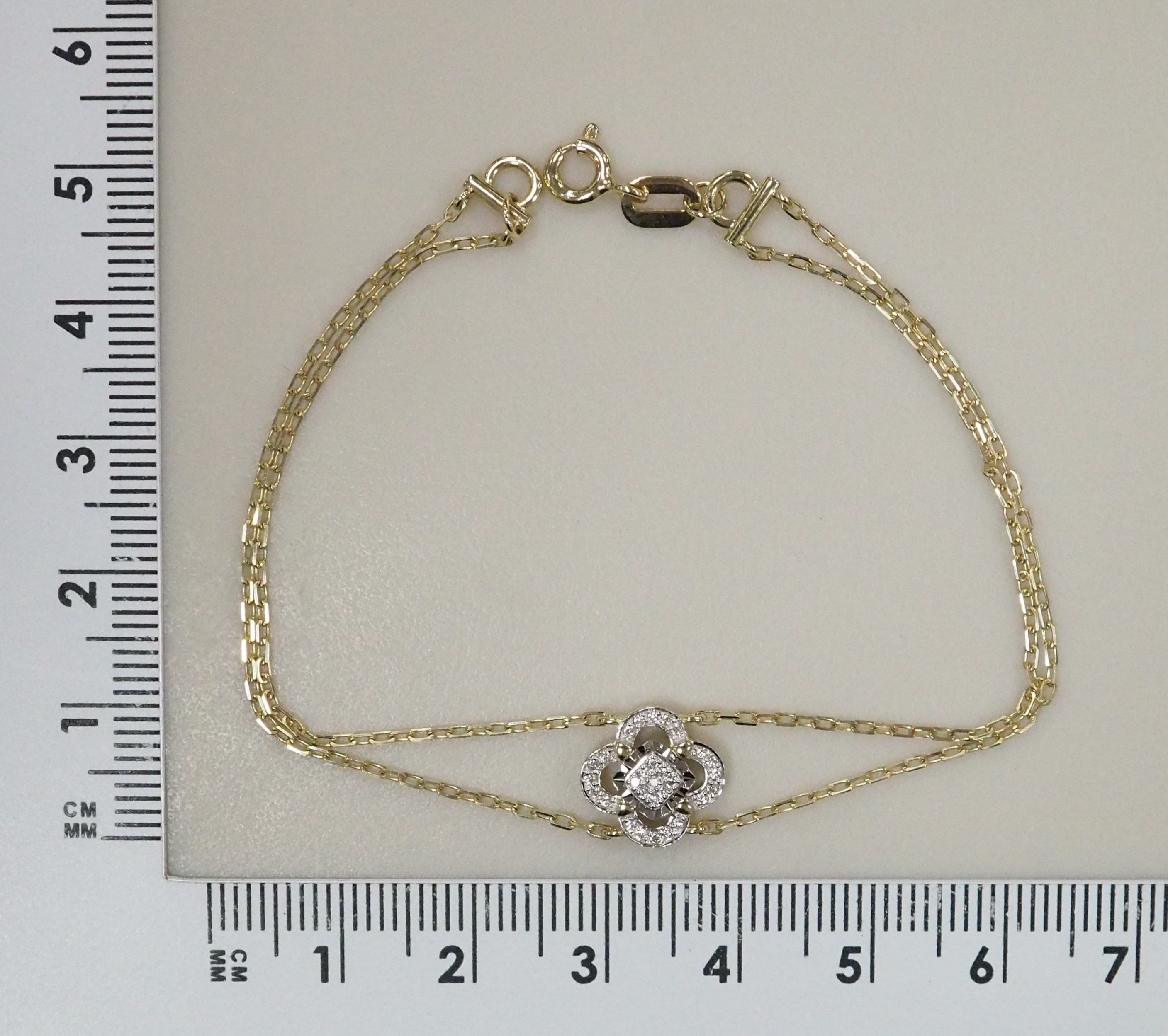 Браслет из желтого золота с бриллиантами "Клевер"